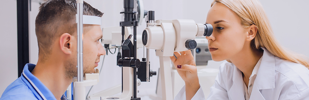 optometrist examining patient